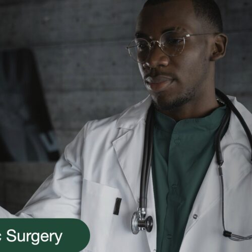 Orthopaedic Surgeon looking at x-ray